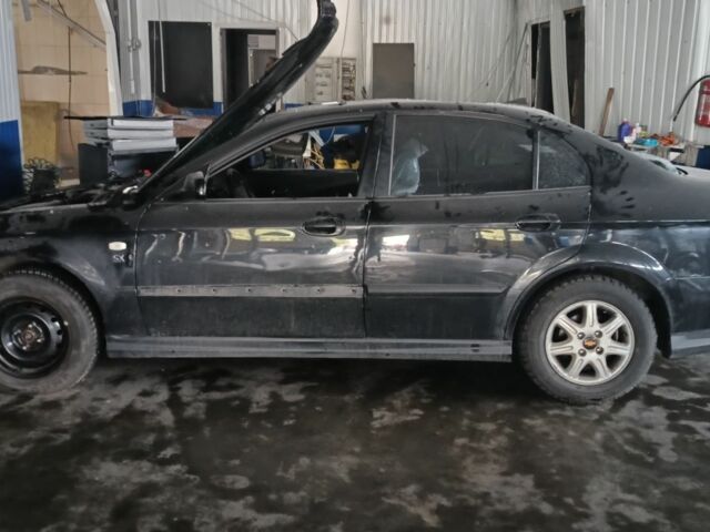 Черный Шевроле Эванда, объемом двигателя 2 л и пробегом 294 тыс. км за 1354 $, фото 1 на Automoto.ua