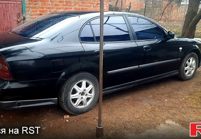 Чорний Шевроле Еванда, об'ємом двигуна 2 л та пробігом 220 тис. км за 2500 $, фото 1 на Automoto.ua