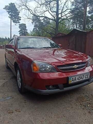 Красный Шевроле Эванда, объемом двигателя 2 л и пробегом 177 тыс. км за 4500 $, фото 1 на Automoto.ua