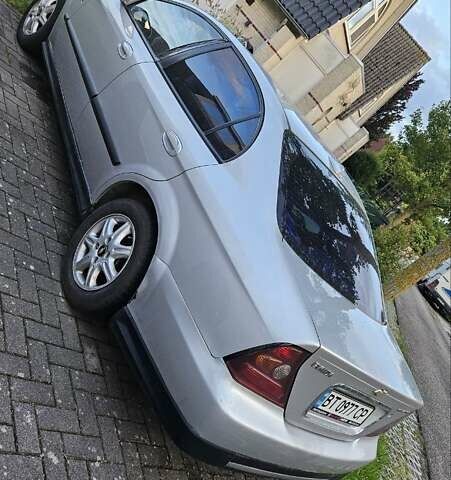 Серый Шевроле Эванда, объемом двигателя 2 л и пробегом 289 тыс. км за 3300 $, фото 1 на Automoto.ua