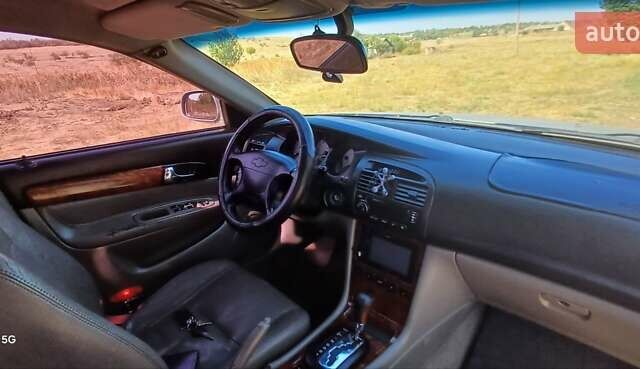 Серый Шевроле Эванда, объемом двигателя 2 л и пробегом 283 тыс. км за 2800 $, фото 1 на Automoto.ua