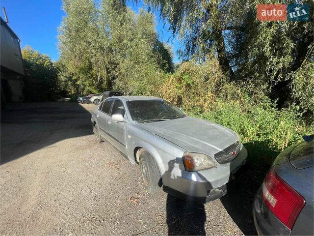 Серый Шевроле Эванда, объемом двигателя 2 л и пробегом 300 тыс. км за 1300 $, фото 1 на Automoto.ua