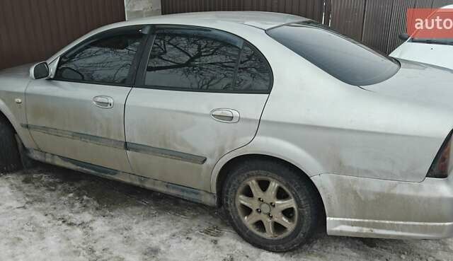 Сірий Шевроле Еванда, об'ємом двигуна 2 л та пробігом 280 тис. км за 3800 $, фото 1 на Automoto.ua