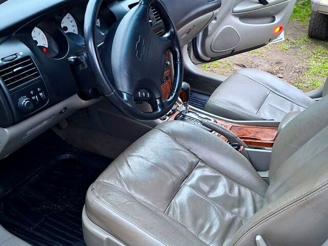 Серый Шевроле Эванда, объемом двигателя 2 л и пробегом 180 тыс. км за 3200 $, фото 1 на Automoto.ua