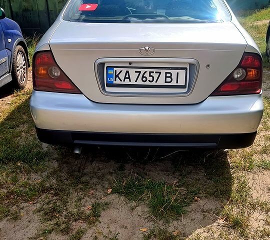 Серый Шевроле Эванда, объемом двигателя 2 л и пробегом 344 тыс. км за 3800 $, фото 1 на Automoto.ua