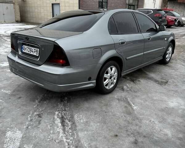 Сірий Шевроле Еванда, об'ємом двигуна 2 л та пробігом 267 тис. км за 3600 $, фото 1 на Automoto.ua