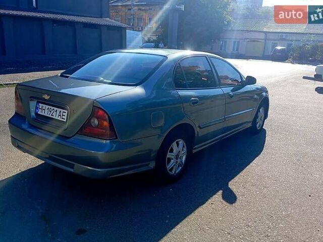 Сірий Шевроле Еванда, об'ємом двигуна 2 л та пробігом 288 тис. км за 3400 $, фото 1 на Automoto.ua