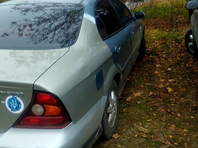 Серый Шевроле Эванда, объемом двигателя 2 л и пробегом 200 тыс. км за 2200 $, фото 1 на Automoto.ua