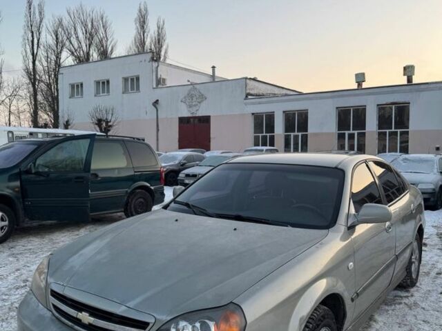 Серый Шевроле Эванда, объемом двигателя 2 л и пробегом 300 тыс. км за 2500 $, фото 1 на Automoto.ua