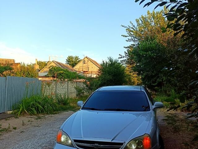 Серый Шевроле Эванда, объемом двигателя 2 л и пробегом 260 тыс. км за 3550 $, фото 1 на Automoto.ua