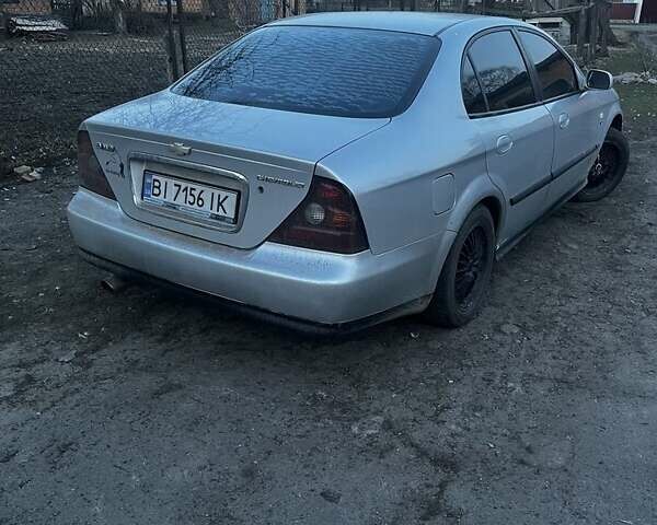 Сірий Шевроле Еванда, об'ємом двигуна 2 л та пробігом 358 тис. км за 3500 $, фото 1 на Automoto.ua