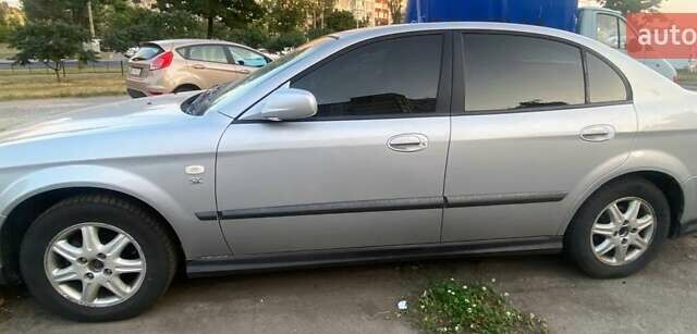 Серый Шевроле Эванда, объемом двигателя 2 л и пробегом 172 тыс. км за 4500 $, фото 1 на Automoto.ua