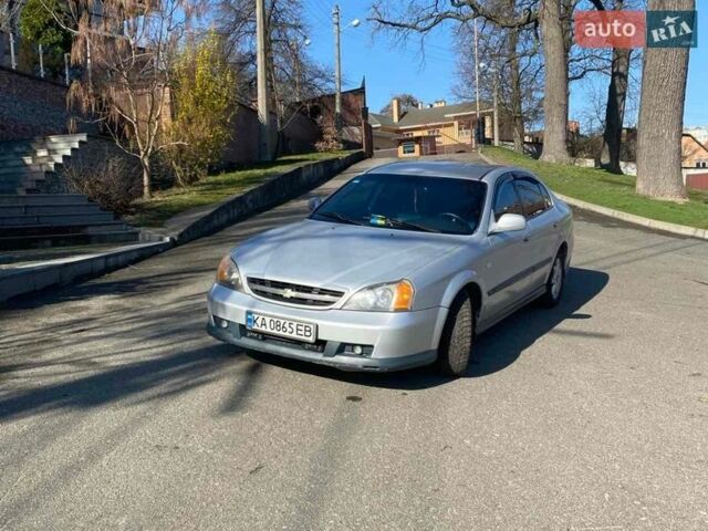Серый Шевроле Эванда, объемом двигателя 2 л и пробегом 333 тыс. км за 2699 $, фото 1 на Automoto.ua