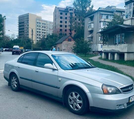 Сірий Шевроле Еванда, об'ємом двигуна 2 л та пробігом 230 тис. км за 3550 $, фото 1 на Automoto.ua