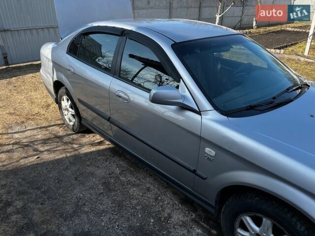 Серый Шевроле Эванда, объемом двигателя 2 л и пробегом 250 тыс. км за 3100 $, фото 1 на Automoto.ua