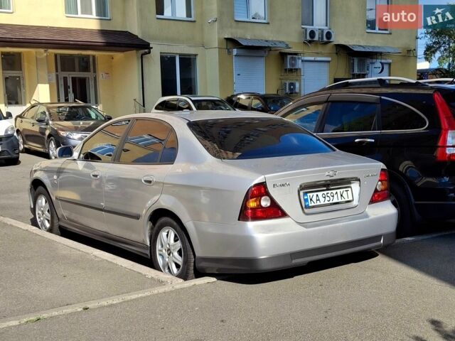 Сірий Шевроле Еванда, об'ємом двигуна 2 л та пробігом 290 тис. км за 3999 $, фото 1 на Automoto.ua