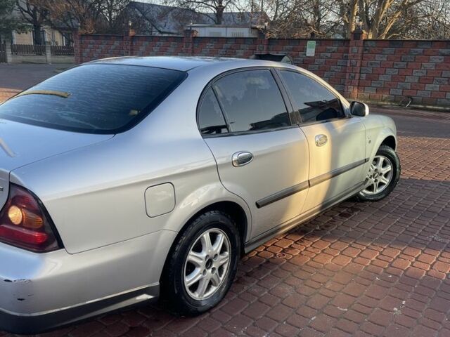 Сірий Шевроле Еванда, об'ємом двигуна 2 л та пробігом 306 тис. км за 4000 $, фото 1 на Automoto.ua