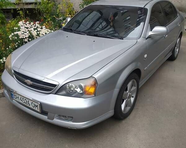 Сірий Шевроле Еванда, об'ємом двигуна 2.5 л та пробігом 232 тис. км за 4800 $, фото 1 на Automoto.ua