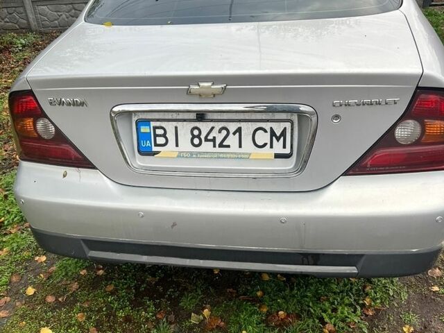 Сірий Шевроле Еванда, об'ємом двигуна 2.5 л та пробігом 255 тис. км за 3000 $, фото 1 на Automoto.ua