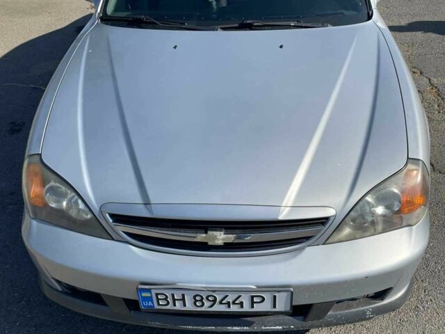 Сірий Шевроле Еванда, об'ємом двигуна 2.5 л та пробігом 160 тис. км за 5224 $, фото 1 на Automoto.ua