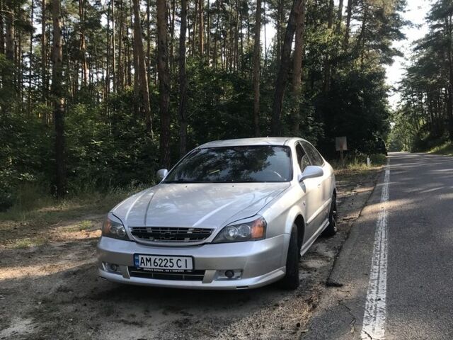 Серый Шевроле Эванда, объемом двигателя 2 л и пробегом 300 тыс. км за 2650 $, фото 1 на Automoto.ua