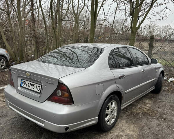 Сірий Шевроле Еванда, об'ємом двигуна 2.5 л та пробігом 260 тис. км за 3300 $, фото 1 на Automoto.ua