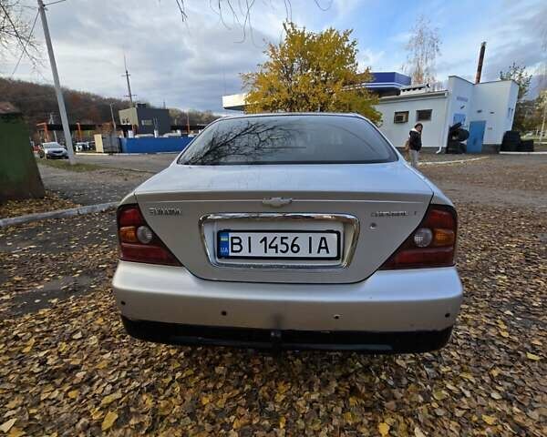 Серый Шевроле Эванда, объемом двигателя 2 л и пробегом 314 тыс. км за 3900 $, фото 1 на Automoto.ua