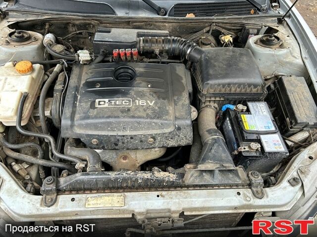 Серый Шевроле Эванда, объемом двигателя 2 л и пробегом 626 тыс. км за 5500 $, фото 1 на Automoto.ua