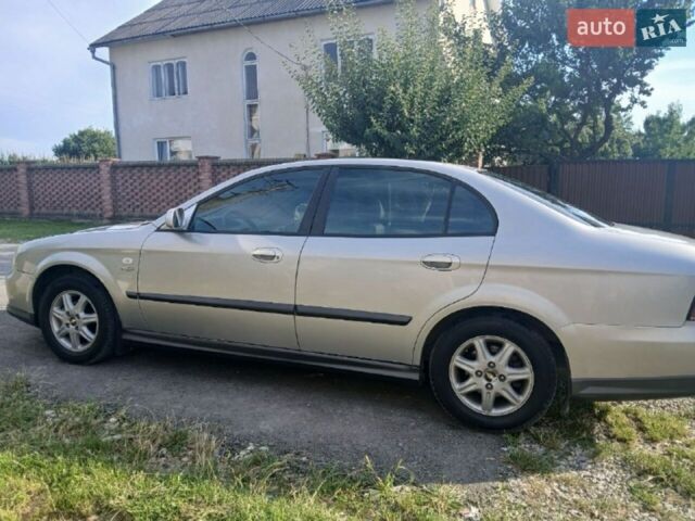 Сірий Шевроле Еванда, об'ємом двигуна 2.49 л та пробігом 113 тис. км за 4500 $, фото 1 на Automoto.ua