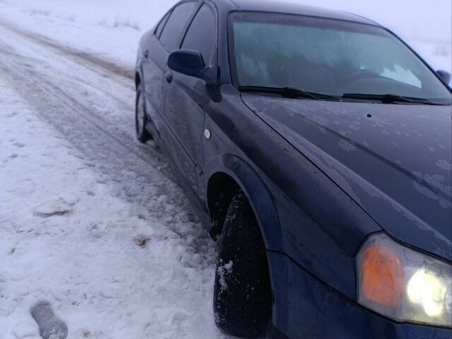 Синій Шевроле Еванда, об'ємом двигуна 2 л та пробігом 324 тис. км за 3000 $, фото 1 на Automoto.ua