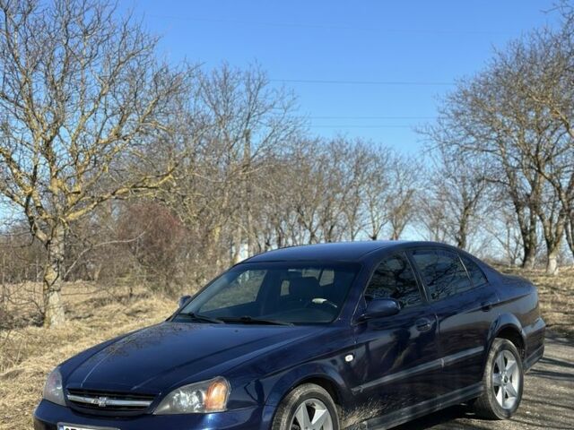 Синій Шевроле Еванда, об'ємом двигуна 2 л та пробігом 400 тис. км за 3000 $, фото 1 на Automoto.ua