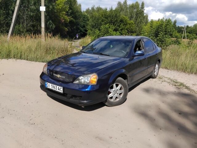 Синій Шевроле Еванда, об'ємом двигуна 2 л та пробігом 400 тис. км за 2449 $, фото 1 на Automoto.ua
