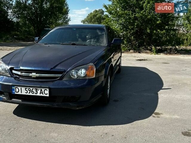 Синий Шевроле Эванда, объемом двигателя 2 л и пробегом 400 тыс. км за 2500 $, фото 1 на Automoto.ua