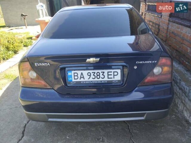 Синий Шевроле Эванда, объемом двигателя 2 л и пробегом 175 тыс. км за 5500 $, фото 1 на Automoto.ua