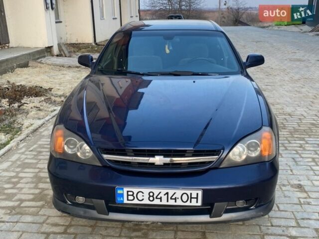 Синий Шевроле Эванда, объемом двигателя 2 л и пробегом 240 тыс. км за 2000 $, фото 1 на Automoto.ua