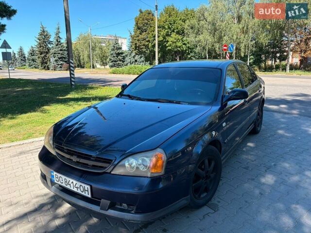 Синий Шевроле Эванда, объемом двигателя 2 л и пробегом 276 тыс. км за 2250 $, фото 1 на Automoto.ua