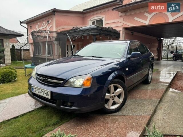 Синій Шевроле Еванда, об'ємом двигуна 2 л та пробігом 400 тис. км за 2450 $, фото 1 на Automoto.ua