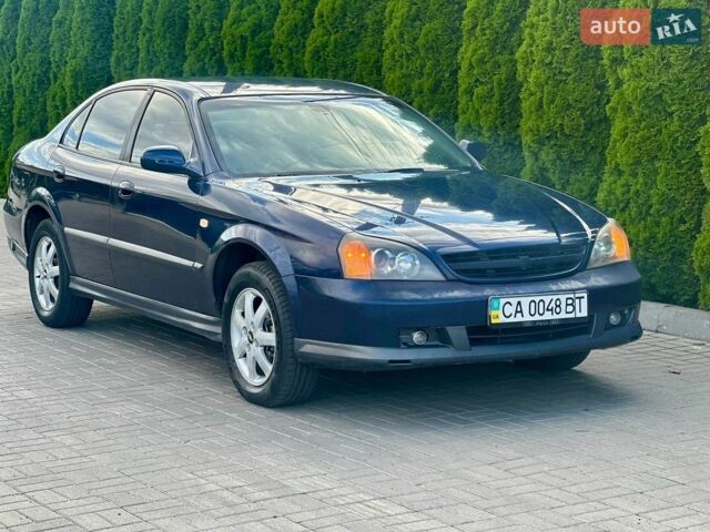 Синій Шевроле Еванда, об'ємом двигуна 2 л та пробігом 260 тис. км за 2600 $, фото 1 на Automoto.ua