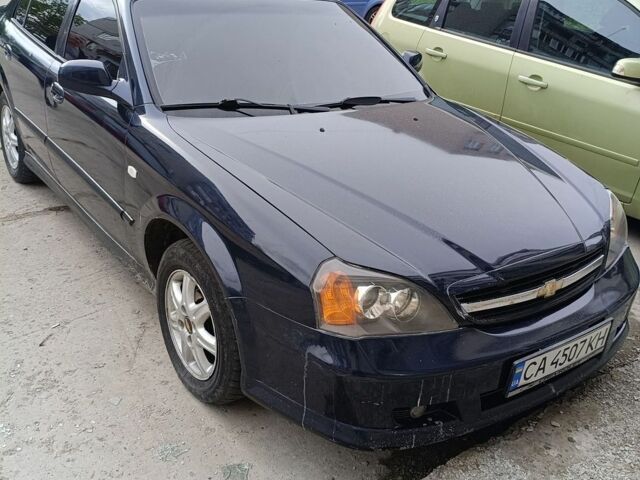 Синій Шевроле Еванда, об'ємом двигуна 2 л та пробігом 406 тис. км за 2999 $, фото 1 на Automoto.ua