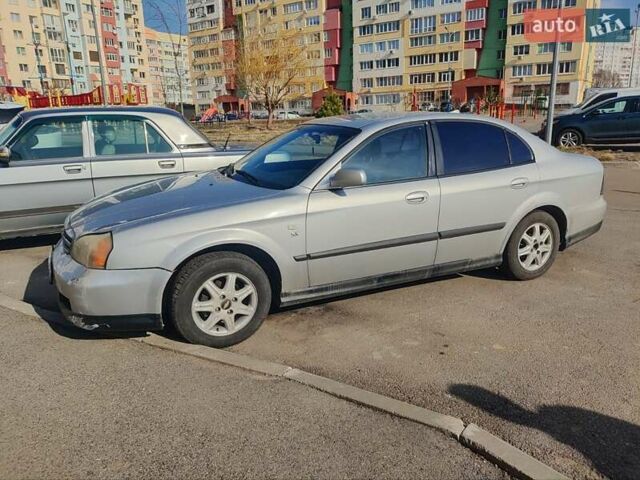 Синий Шевроле Эванда, объемом двигателя 2 л и пробегом 260 тыс. км за 3500 $, фото 1 на Automoto.ua