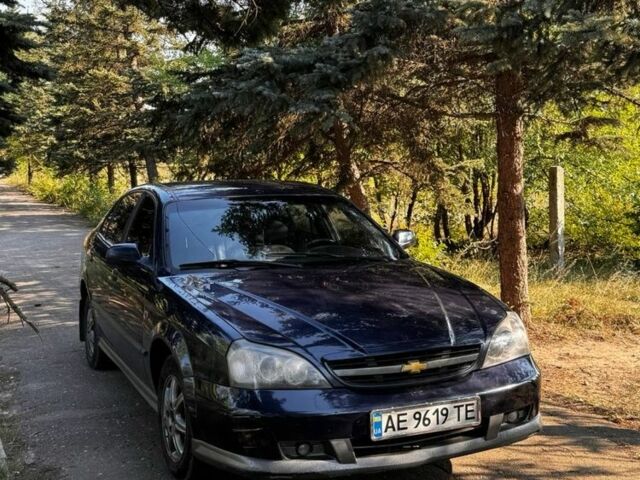 Синій Шевроле Еванда, об'ємом двигуна 2 л та пробігом 195 тис. км за 2509 $, фото 1 на Automoto.ua