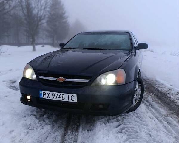 Синій Шевроле Еванда, об'ємом двигуна 2 л та пробігом 330 тис. км за 3450 $, фото 1 на Automoto.ua