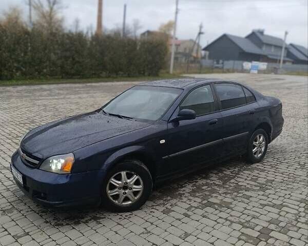 Синий Шевроле Эванда, объемом двигателя 2 л и пробегом 270 тыс. км за 2499 $, фото 1 на Automoto.ua