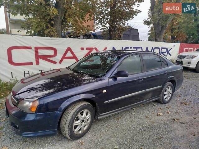 Синий Шевроле Эванда, объемом двигателя 2 л и пробегом 320 тыс. км за 2700 $, фото 1 на Automoto.ua