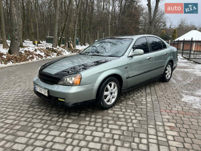 Зеленый Шевроле Эванда, объемом двигателя 2 л и пробегом 245 тыс. км за 1750 $, фото 1 на Automoto.ua