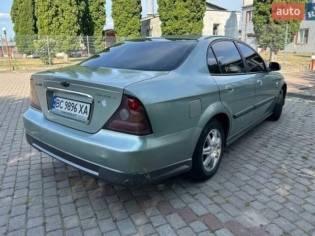 Зелений Шевроле Еванда, об'ємом двигуна 2 л та пробігом 300 тис. км за 2750 $, фото 1 на Automoto.ua