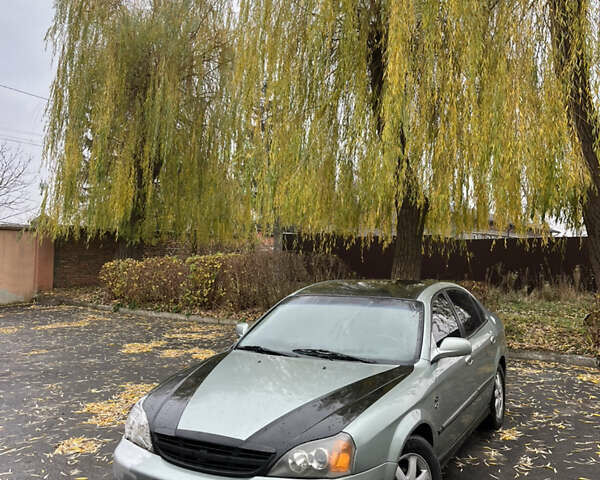 Зелений Шевроле Еванда, об'ємом двигуна 2 л та пробігом 242 тис. км за 1299 $, фото 1 на Automoto.ua