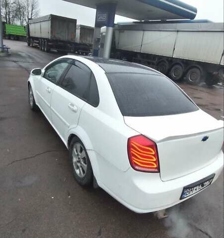 Белый Шевроле Лачетти, объемом двигателя 1.6 л и пробегом 218 тыс. км за 3800 $, фото 1 на Automoto.ua