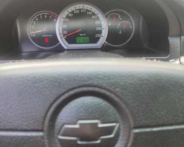 Белый Шевроле Лачетти, объемом двигателя 1.8 л и пробегом 150 тыс. км за 3750 $, фото 1 на Automoto.ua