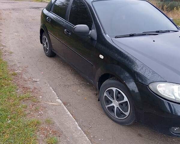 Черный Шевроле Лачетти, объемом двигателя 1.6 л и пробегом 244 тыс. км за 3600 $, фото 1 на Automoto.ua